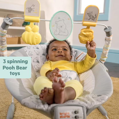 Bright Starts Bouncer Silla Mecedora Winnie The Pooh para Bebé, con vibraciones relajanres, melodías y juguetes, Unisex, 0 a 6 Meses