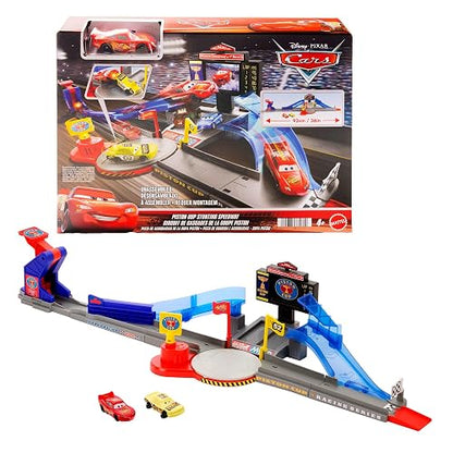Mattel Disney Pixar Cars Pista de Acrobacias Copa Pistón, Circuito Interactivo, Lanzador y Salto épico, recrea la Escena Inicial, para niños Desde 4 años en adelante