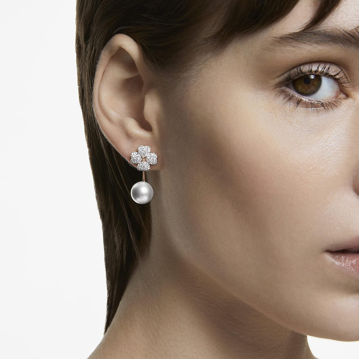 Colección de joyas de vidrio Swarovski Latisha con diseño de flores, arete y pulsera, tono oro rosa y acabado en tono rodio