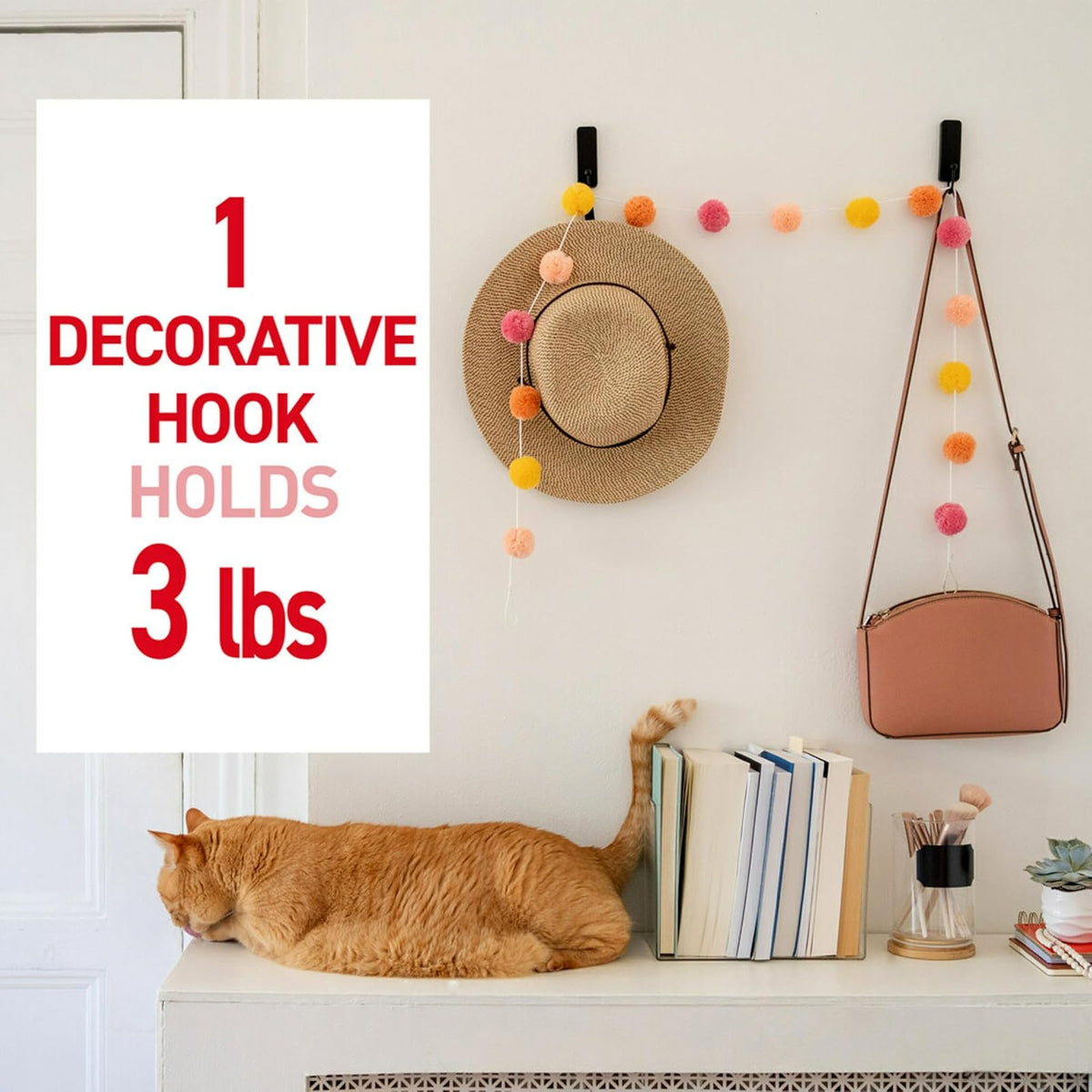 Command Ganchos de Pared Decorativos Medianos, 2 Ganchos Negros y 4 Tiras de Comando