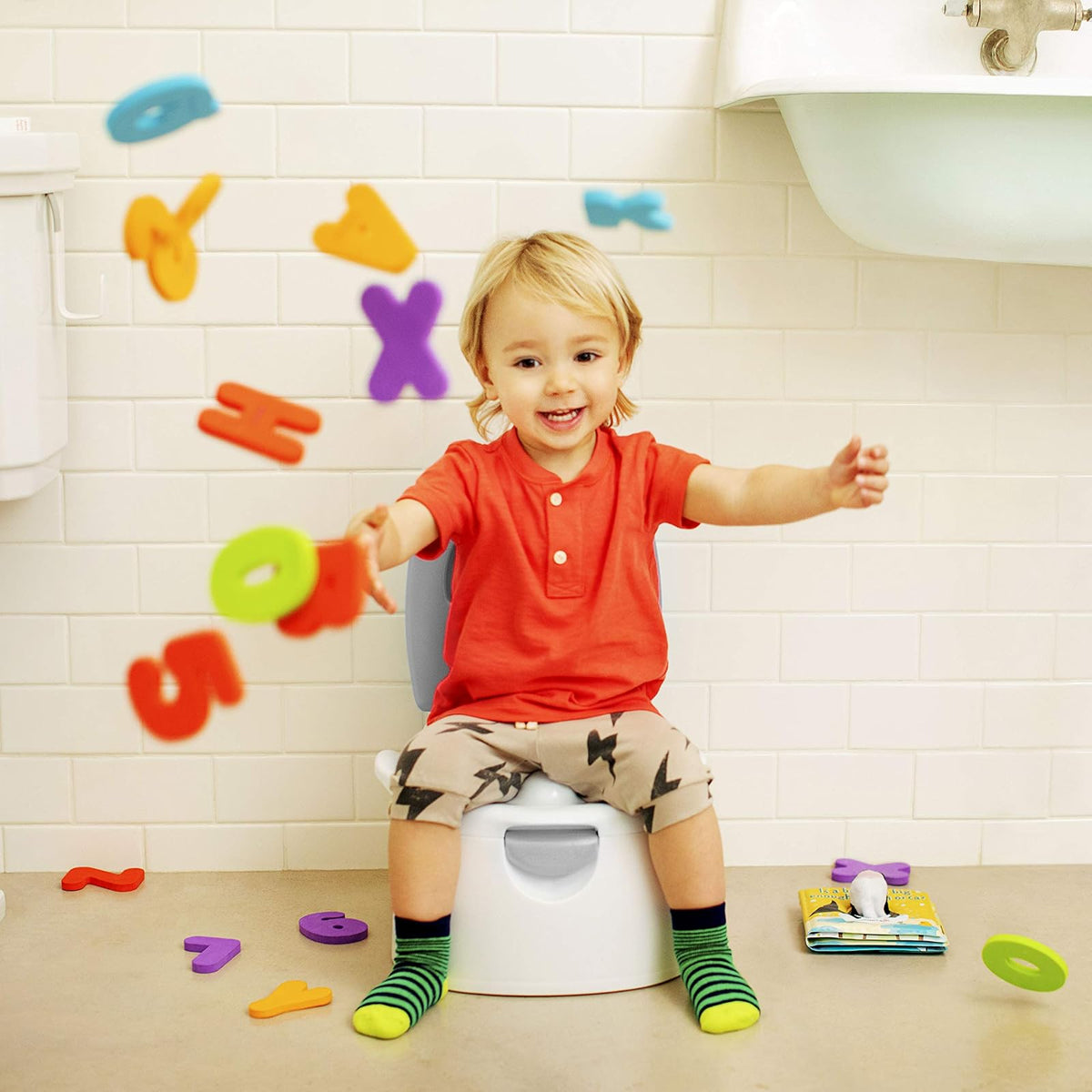 Munchkin 11564 - Entrenador de baño 3 en 1, colores aleatorios