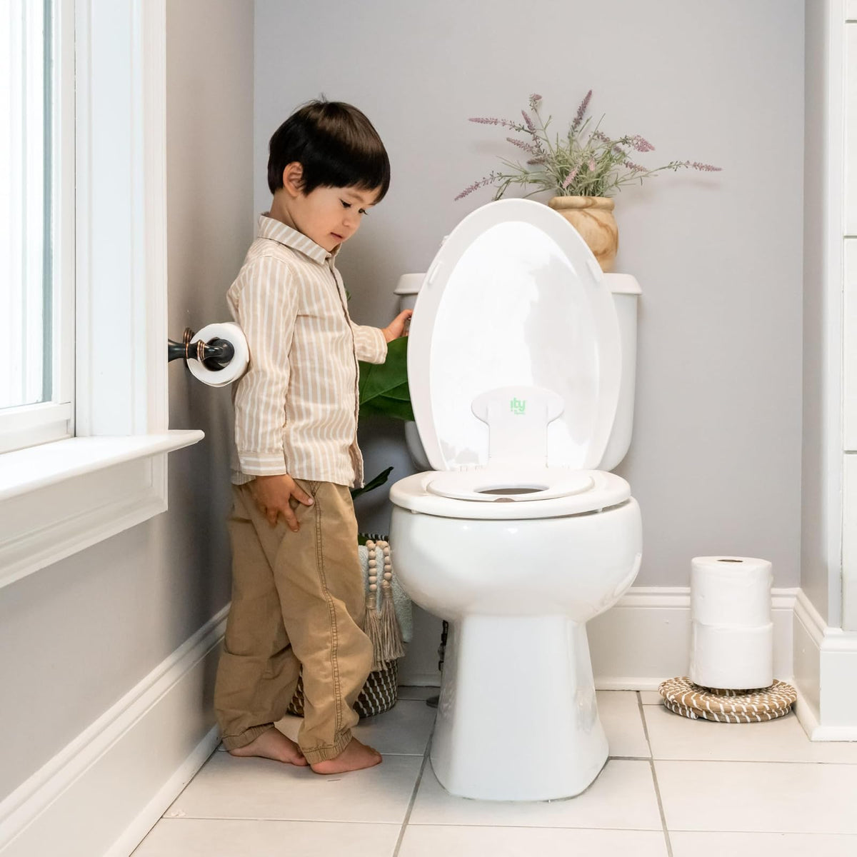 Ingenuity Flip & Sit - Asiento de baño, de inodoro, para Bebé, a partir de 18 meses, color blanco