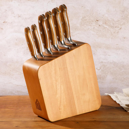 - Juego de 7 cuchillos de cocina de madera de olivo italiano alemán forjado de acero inoxidable, dos veces la marca ganadora de las cosas favoritas de Oprah