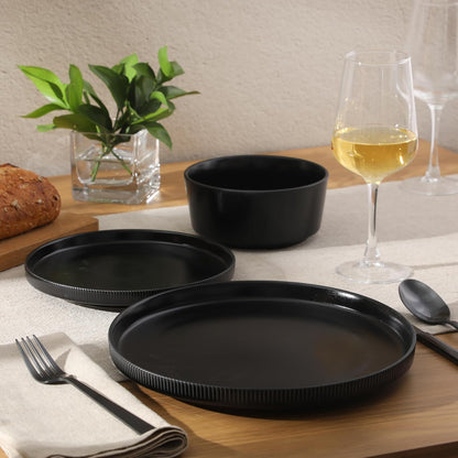 Gibson Home Dempsey Road - Juego de vajilla de gres de 12 piezas, servicio para 4, platos y cuencos negros redondos, duradero y de color sólido, moderno juego de platos en relieve, apto para