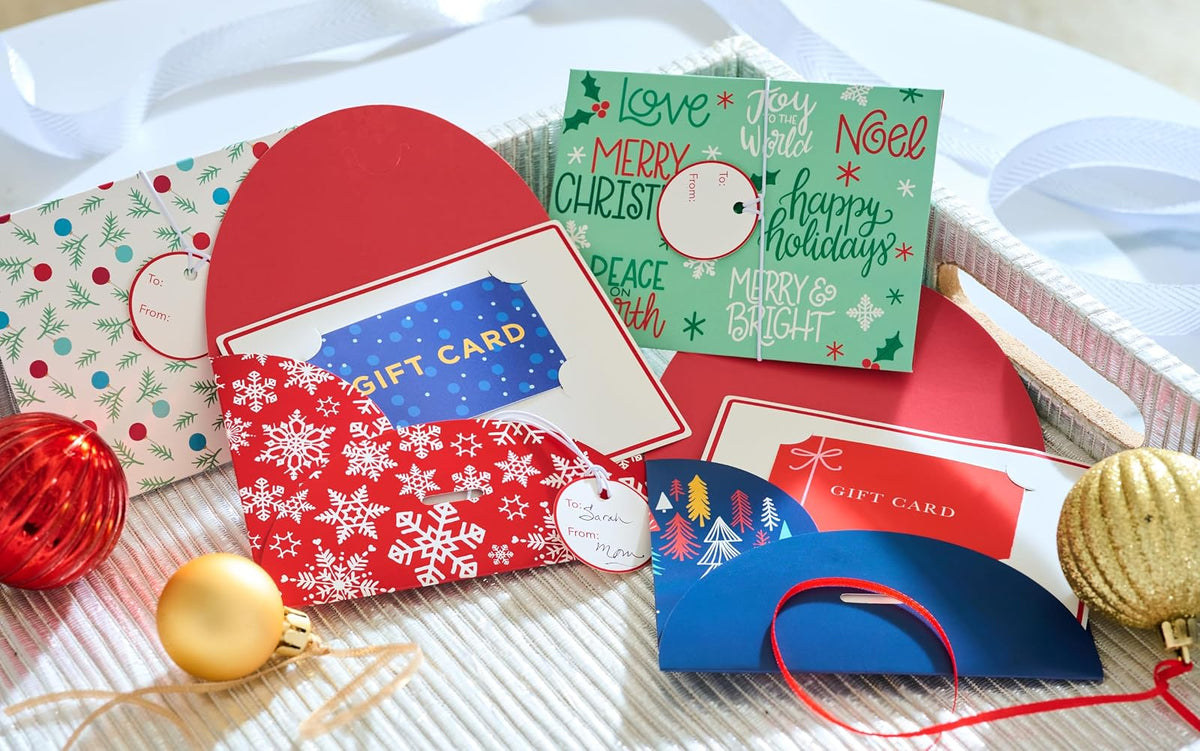 American Greetings - Tarjeteros de regalo de Navidad, copos de nieve, acebo y árboles de Navidad (12 unidades)