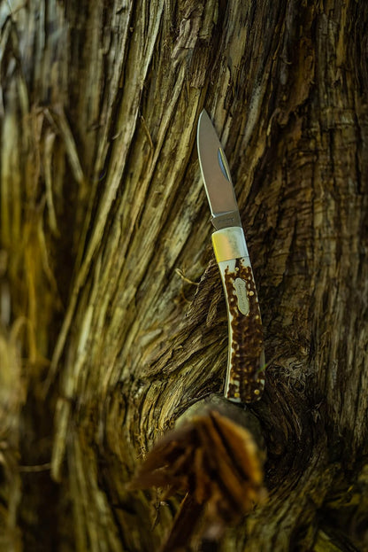 Uncle Henry Next Gen Staglon 5UH Bruin Cuchillo Plegable de 6.5 Pulgadas con Hoja de Punta caída de Acero Inoxidable de 2.8 Pulgadas y Mango de Staglon para Caza, Camping y EDC