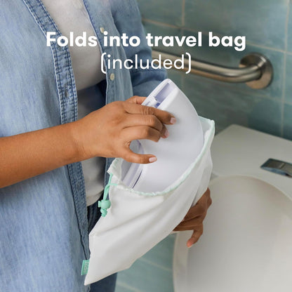 Frida - Asiento portátil plegable para inodoro para bebé, asiento plegable para orinal de viaje para niños pequeños, se adapta a inodoros redondos y ovalados, base antideslizante, asas, incluye bolsa