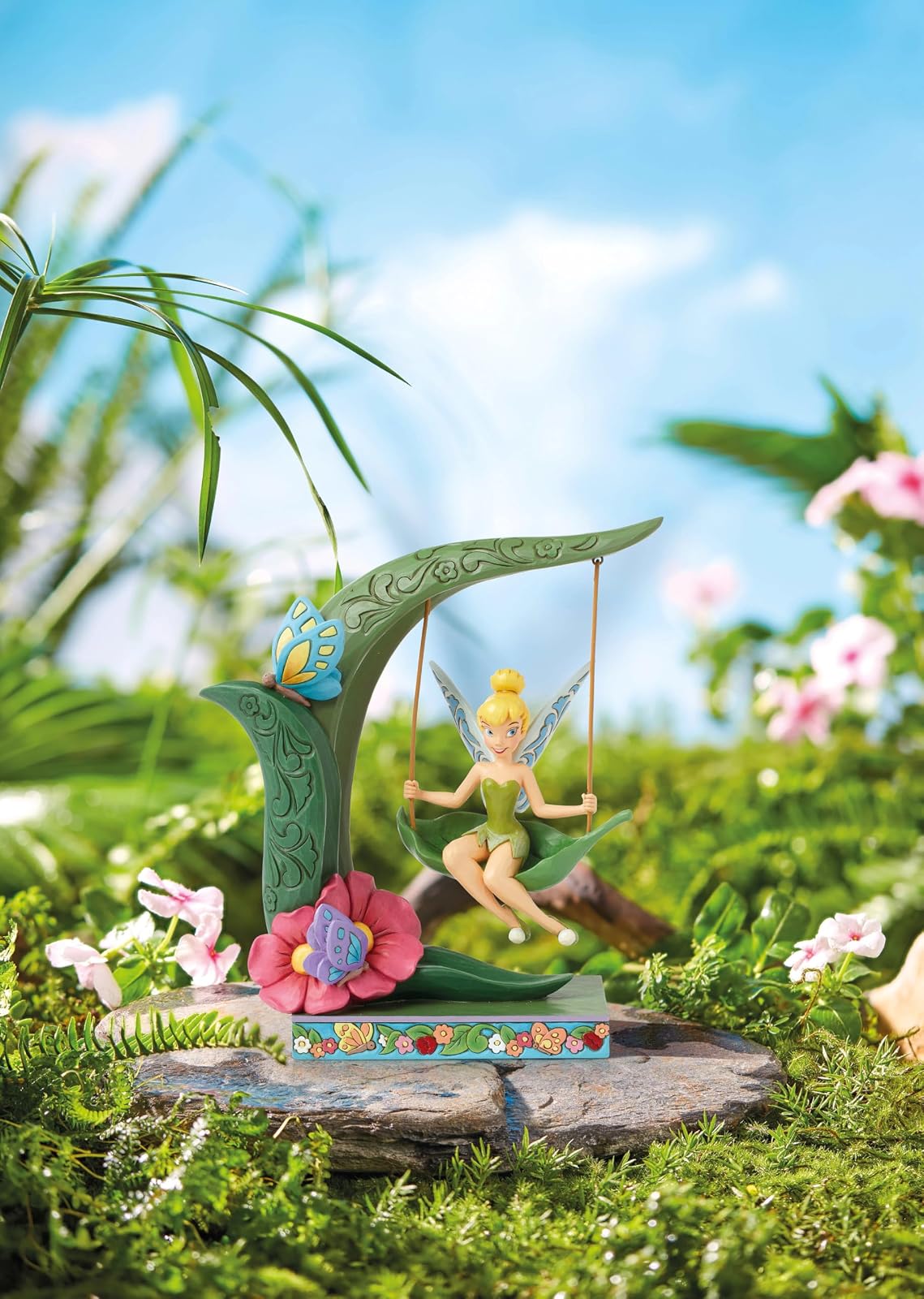 Enesco Disney Traditions Collection by Jim Shore Peter Pan Tinker Bell Spring Swing Figurita de resina de piedra pintada a mano coleccionable Disney Tink Figurines para decoración del hogar, 8.63