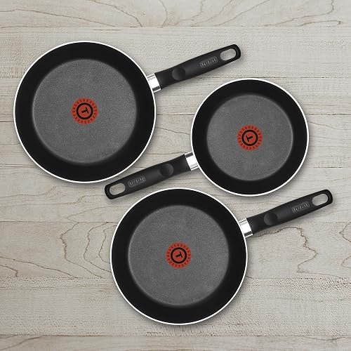 T-FAL Juego de sartenes easy cook negro cubierta antiadherente para una cocina fácil con indicador de calor thermo-señal y base de difusión. Medidas de sartén 20, 24 y 26 cm, B4440482AMAM