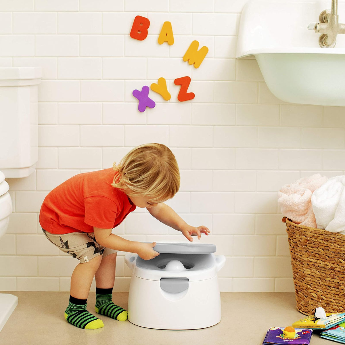 Munchkin 11564 - Entrenador de baño 3 en 1, colores aleatorios
