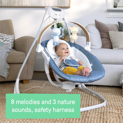 Ingenuity SimpleComfort - Columpio calmante compacto, barra de juguetes giratoria, asiento giratorio, 6 velocidades, para edades de 0 a 9 meses, hasta 20 libras, Chambray