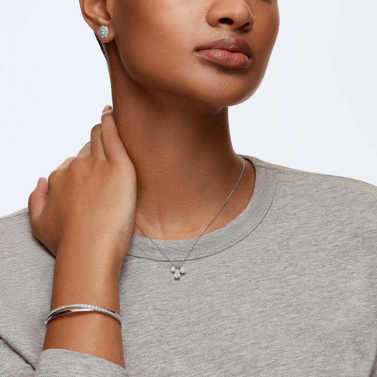 SWAROVSKI Twist Rows Crystal Bracelet Collection, Rhodium & Rose Gold Tone Finish, Clear Crystals