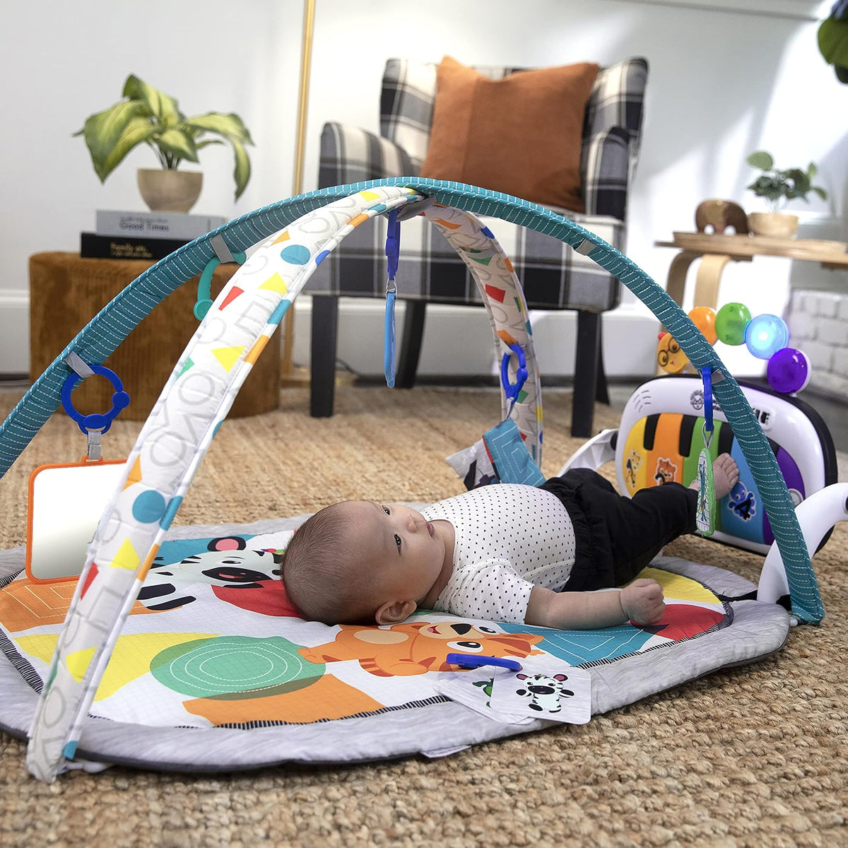 Baby Einstein Kickin’ Tunes - Gimnasio de Actividades 4 en 1 para bebé, con música y Luces, Dos Barras de Juguetes, Piano de Juguete para Aprender español, inglés, francés y alemán (Azul)