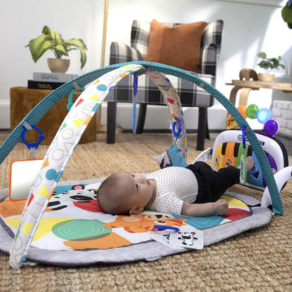 Baby Einstein Kickin’ Tunes - Gimnasio de Actividades 4 en 1 para bebé, con música y Luces, Dos Barras de Juguetes, Piano de Juguete para Aprender español, inglés, francés y alemán (Azul)