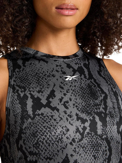 Reebok Apparel ID Performance Tech - Playera sin Mangas para Mujer