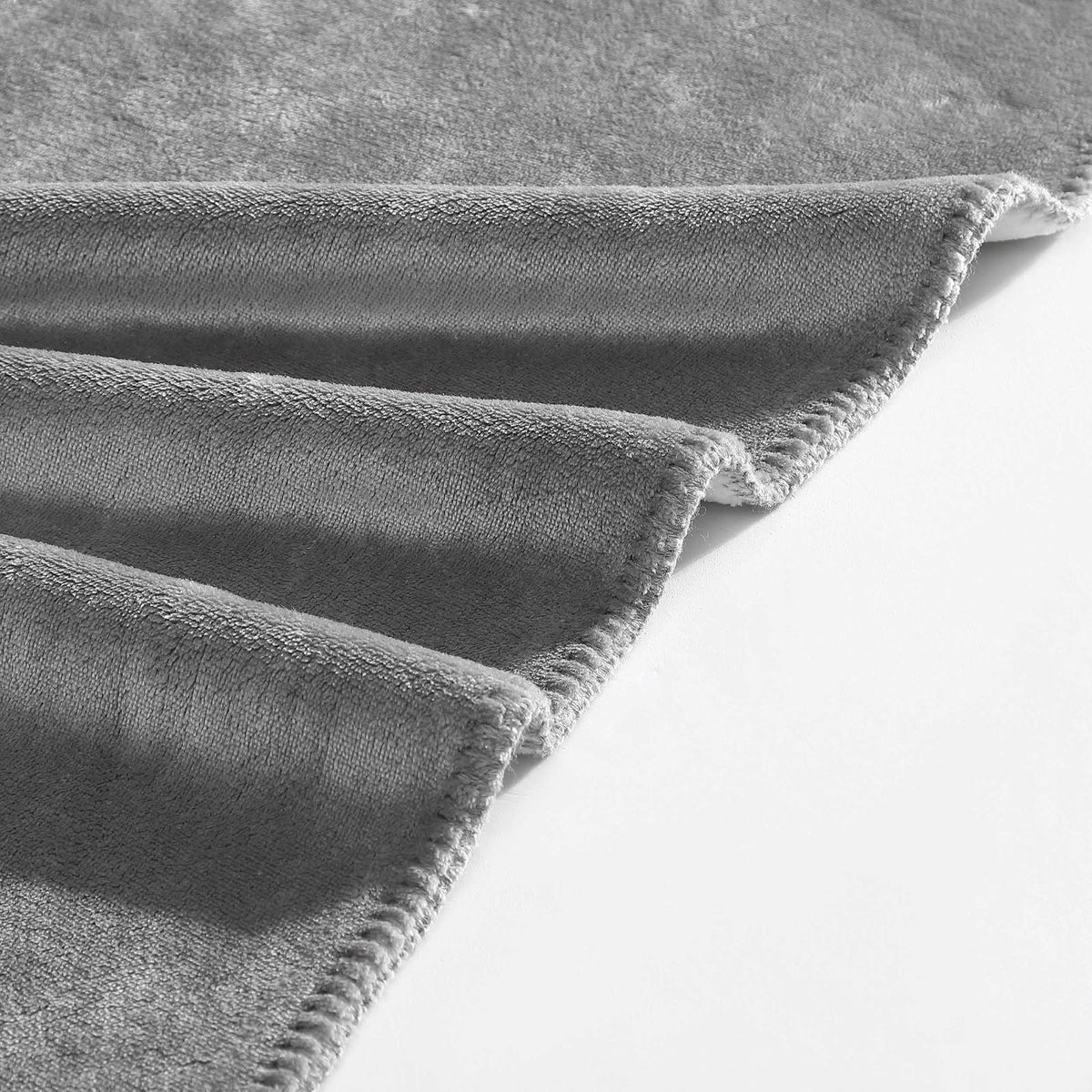 Calvin Klein - Manta Reversible de Felpa de Alta Calidad con Detalles de Punto de azotea, práctica Ropa de Cama de Lujo (Moderno Reversible Gris sólido, 50 x 70)