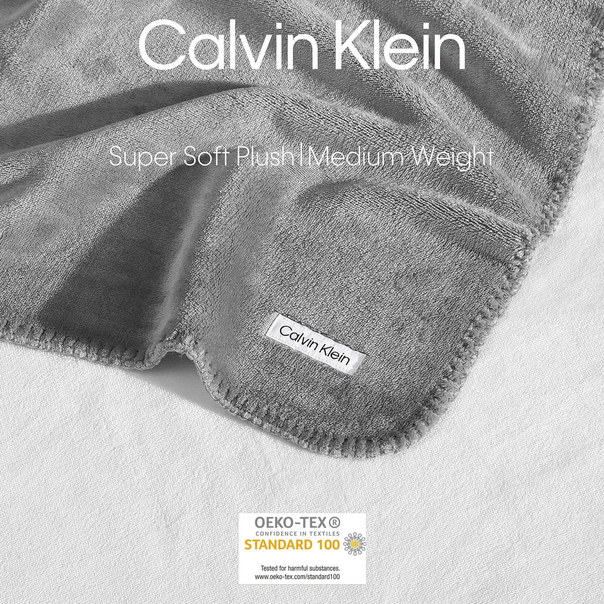 Calvin Klein - Manta Reversible de Felpa de Alta Calidad con Detalles de Punto de azotea, práctica Ropa de Cama de Lujo (Moderno Reversible Gris sólido, 50 x 70)